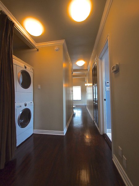 The hall with the in-unit washer and dryer